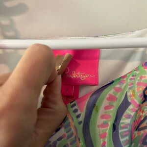 Long sheet overlay dress with chain and ribbon belt